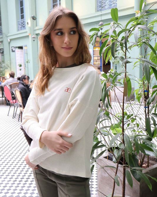 Top Aura Crudo